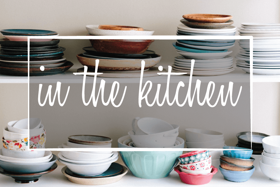 Image of plates on shelves which says "in the kitchen"
